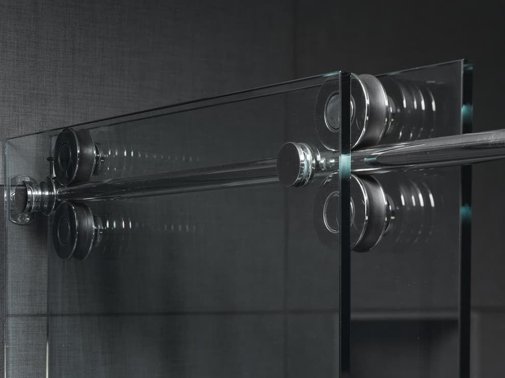 A glass wall with two rods in it