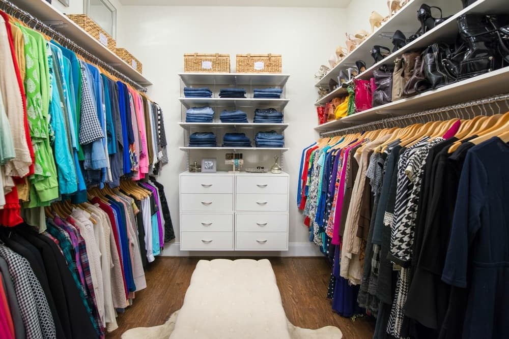 A closet with many different clothes on it